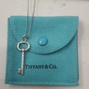 Tiffany & Co. Sterling Key Pendant with Chain.